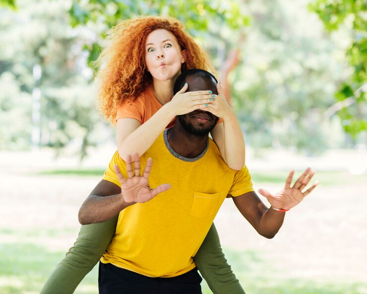 Free Photo interracial couple making silly faces