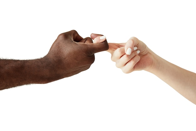 Interracial human hands isolated