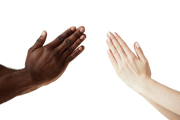 Interracial human hands isolated