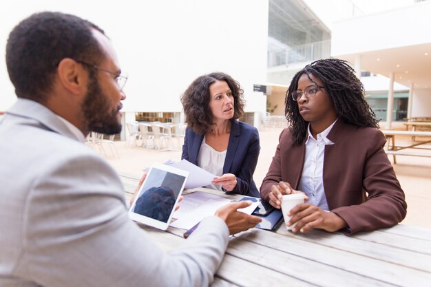 interracial partners discussing agreement