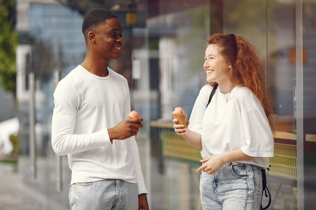 Interracial students has a fun and laughs cheerfully in park