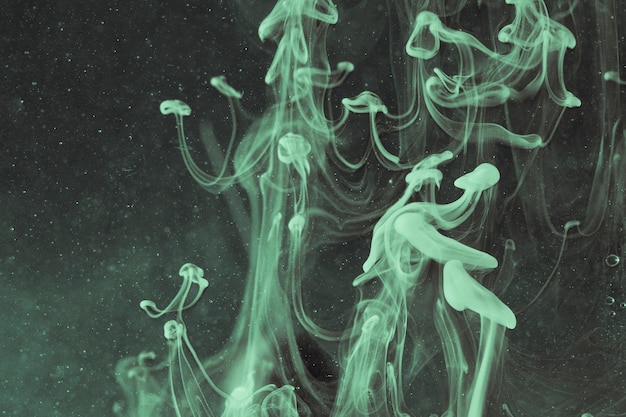 Free photo inverted colours underwater jellyfish abstract in oil