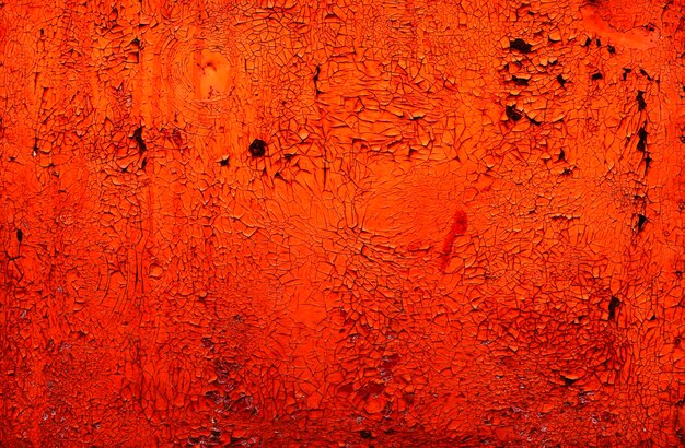 Iron texture or background with rusty peeling red paint high contrast and resolution image with place for text template for design