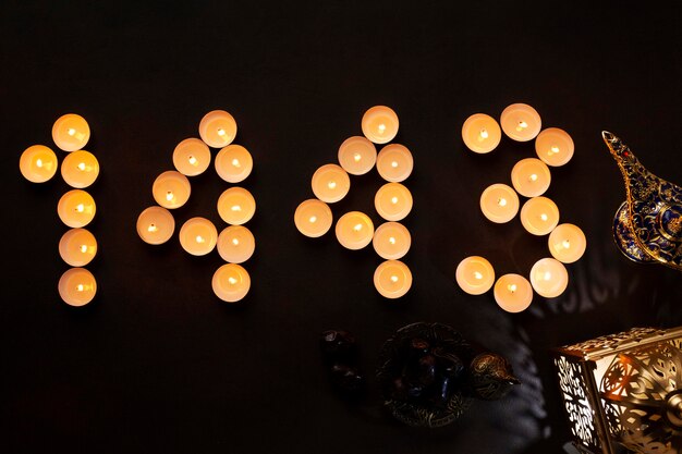 Islamic new year decoration with number made of small candles