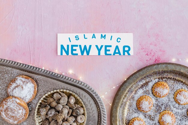 Islamic New Year words and different sweets 