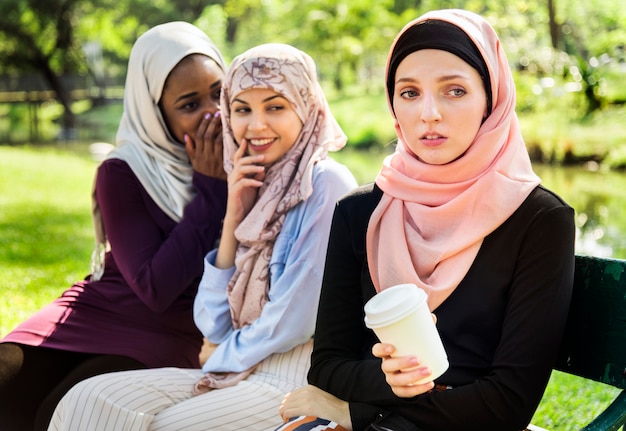 Premium Photo | Islamic women gossiping and bullying thier friend