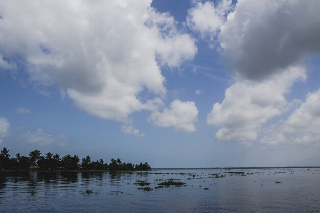 Island with blue sky and water