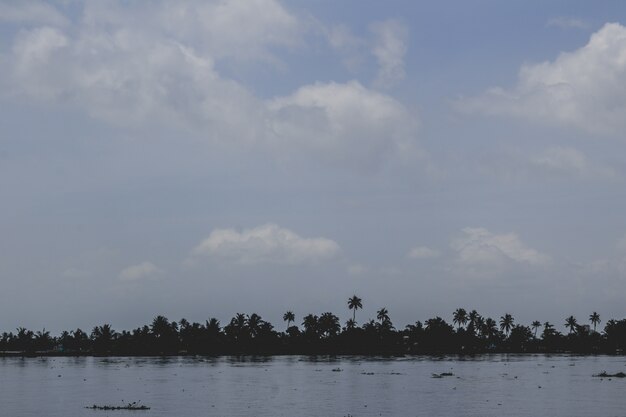 Island with blue sky and water