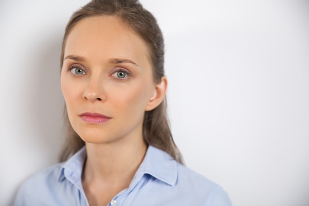 Isolated Closeup of Serious Attractive Young Woman