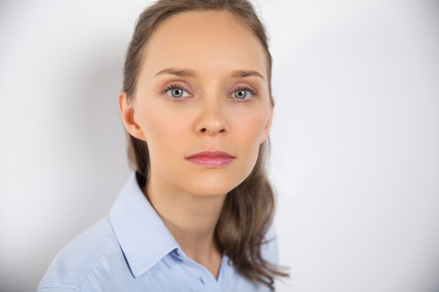 Isolated Closeup of Serious Lovely Young Woman