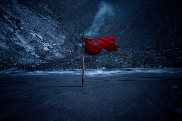 Free photo isolated red flag in frozen area