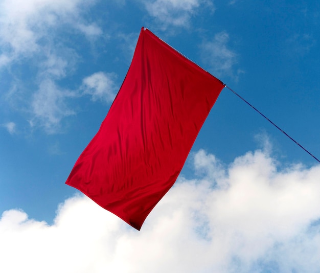 Isolated red flag in nature