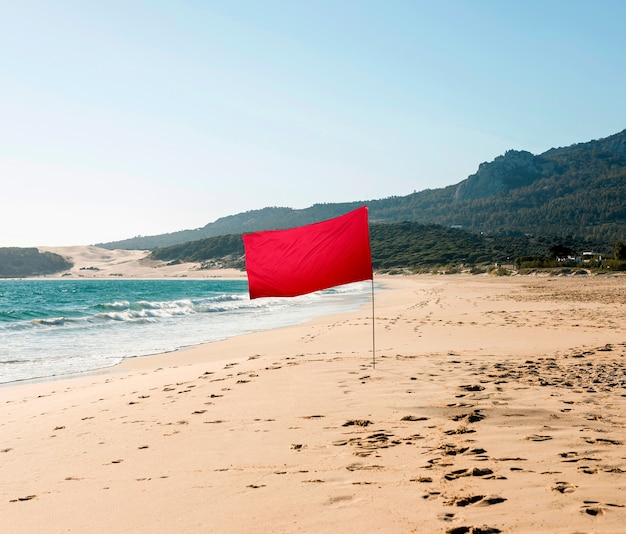 Isolated red flag in nature