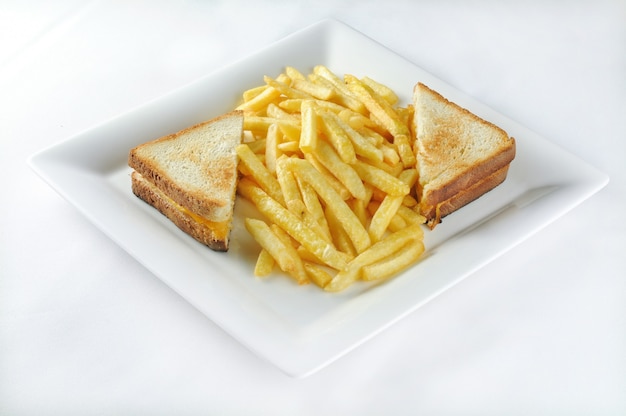 Isolated shot of Croque monsieur with french fries  - perfect for a food blog or menu usage