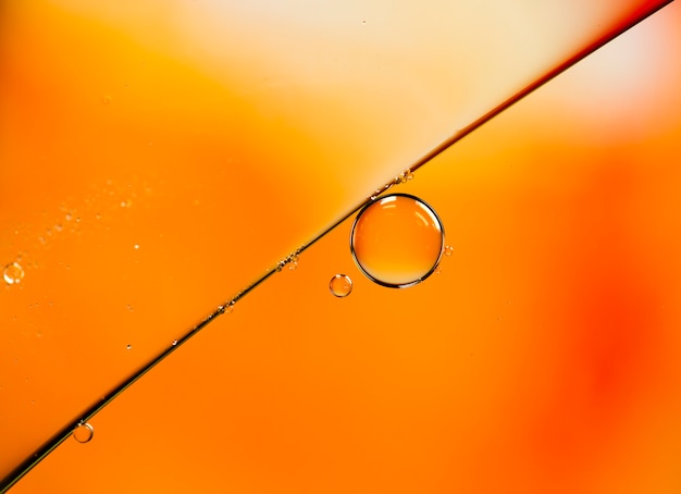 Isolated soap oil bubbles on a watery background