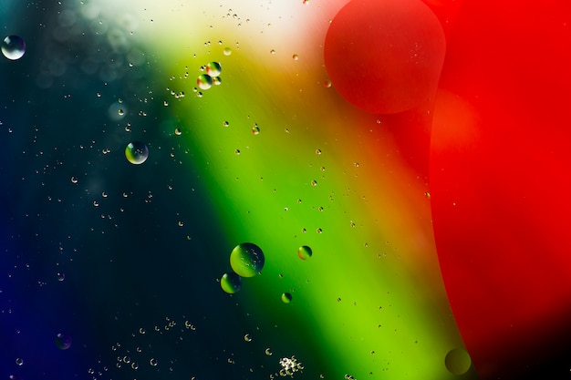 Isolated soap oil bubbles on a watery background
