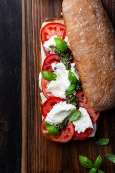 Italian ciabatta bread with mozzarella, tomatoes and basil