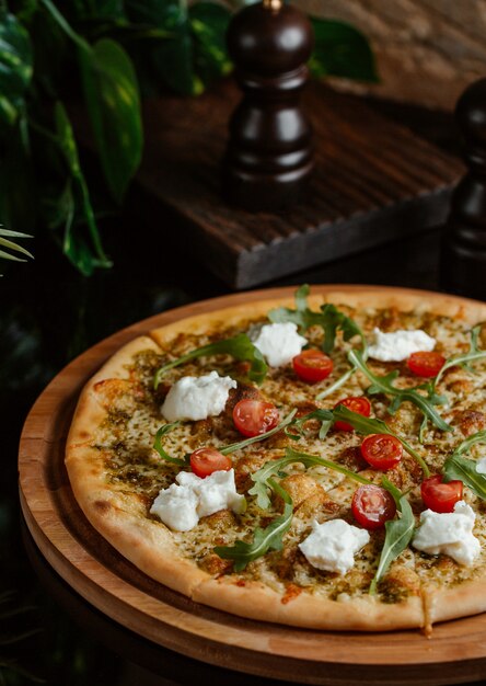 Italian fast food pizza with full vegetables and greenery