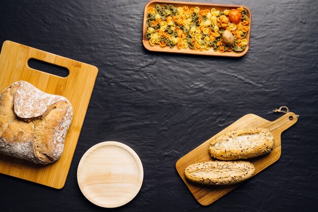 italian food concept with bread, pasta and space