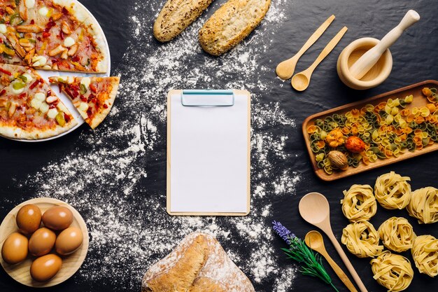 Italian food decoration with clipboard in middle