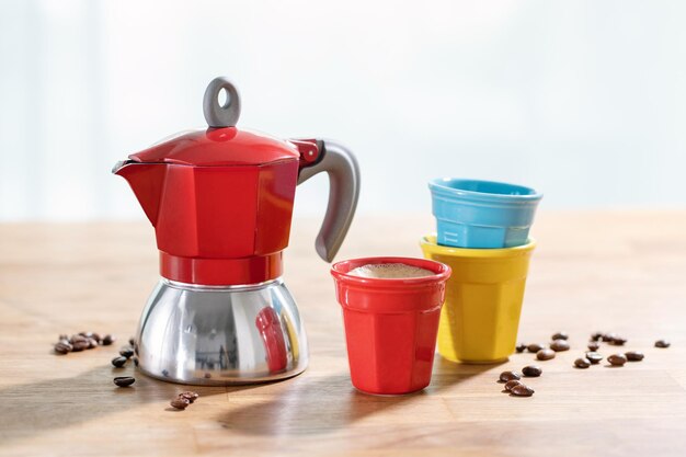 Italian mocca coffee with cups on table