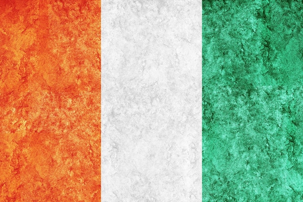 Free photo ivory coast metallic flag, textured flag, grunge flag