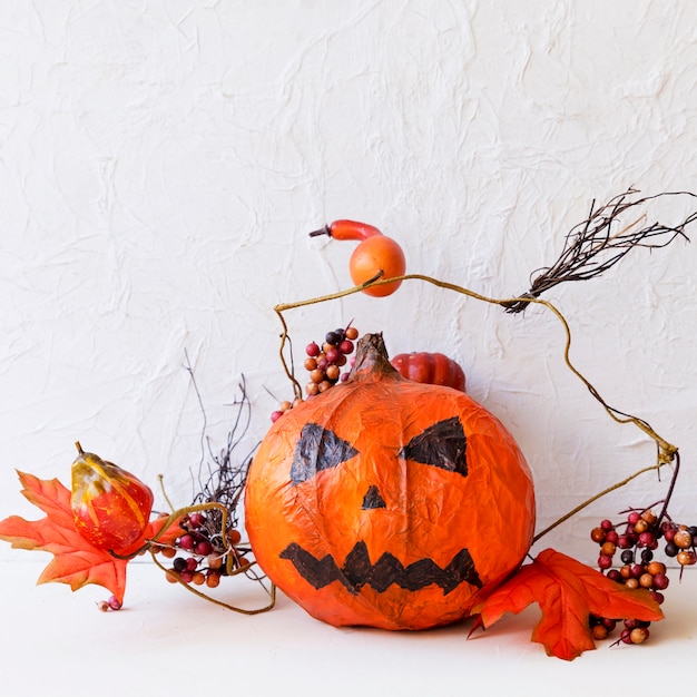 Jack-o-lantern and autumn decorations