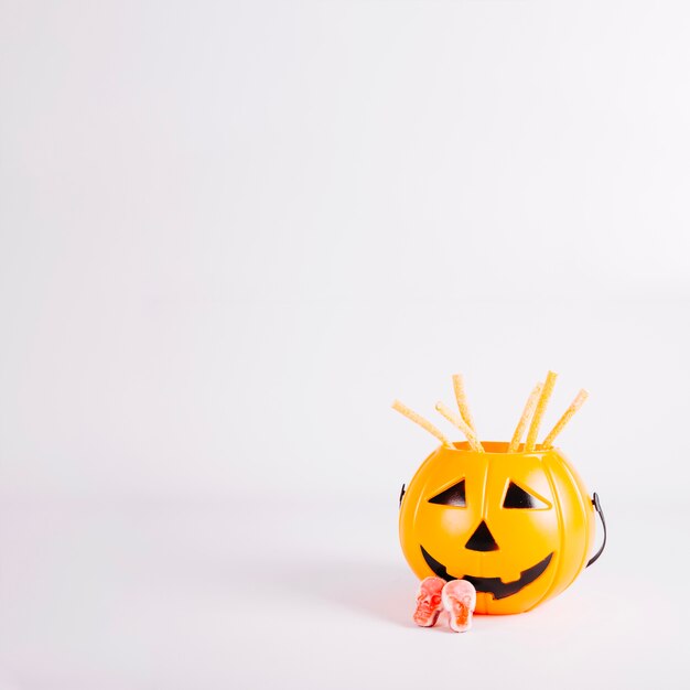 Jack-o-lantern bucket and skull candy 
