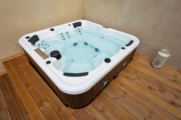 Jacuzzi on wooden floor in a house