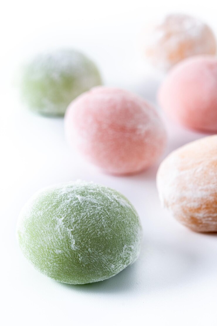 Free Photo japanese colorful mochi isolated on white background