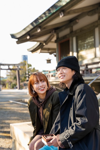 Japanese couple enjoying a date outdoors