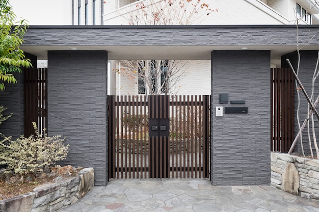 Japanese house entrance with fence