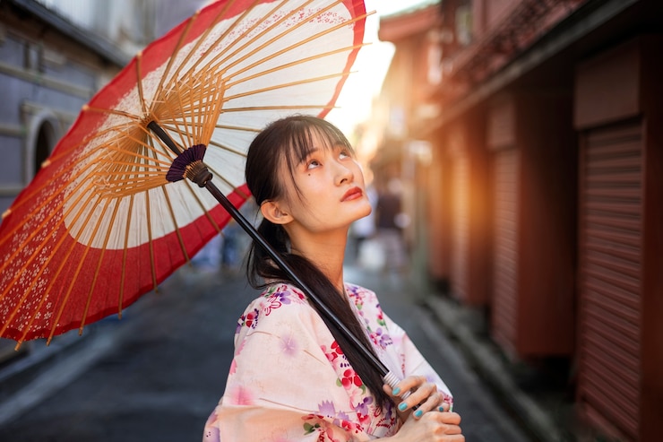 無料Photo 若い女性による日本の和賀傘の助け