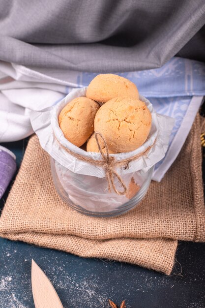 The jar of biscuits in tablecloth