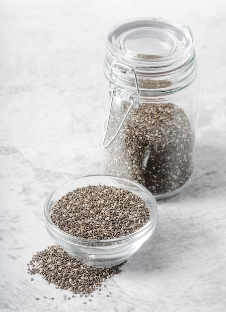 Jar and bowl full of seeds high view