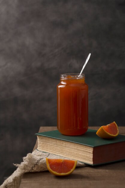 Jar filled with organic homemade orange marmalade