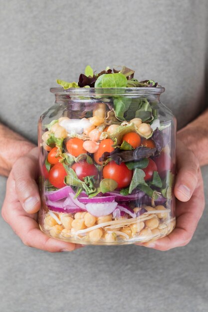 Jar filled with various fruit and veggies