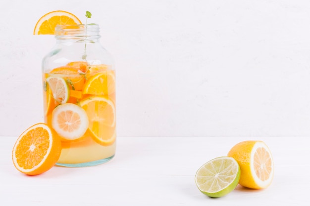 Jar with citrus beverage