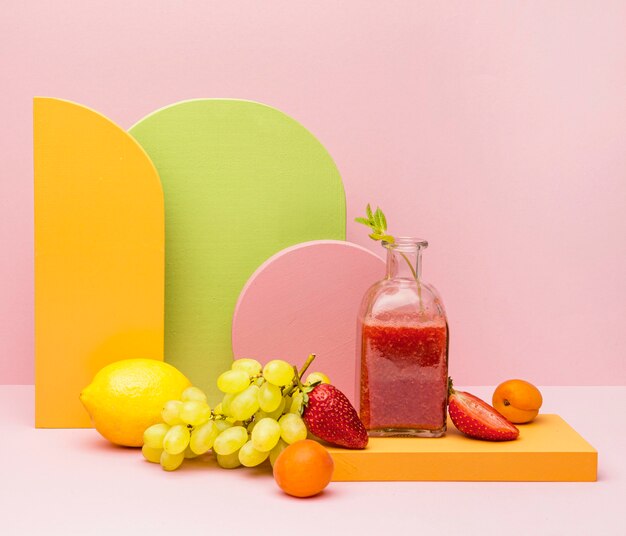 jar with fresh fruits smoothie
