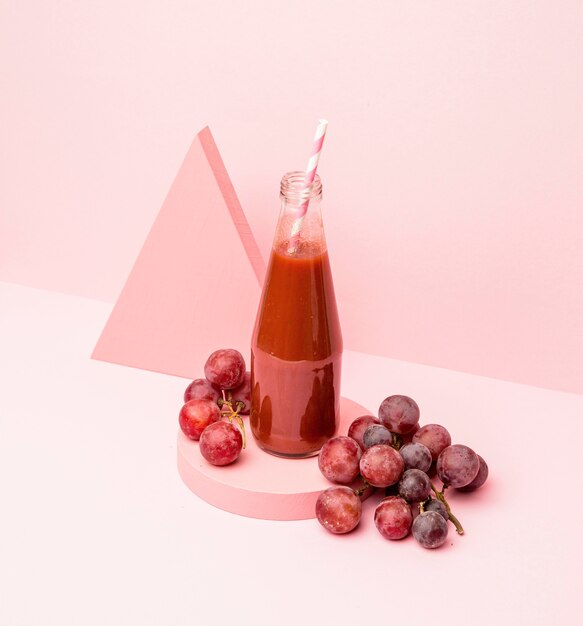 Jar with fresh smoothieof grapes