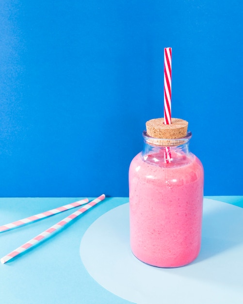 Free photo jar with grapefruit smoothie on table