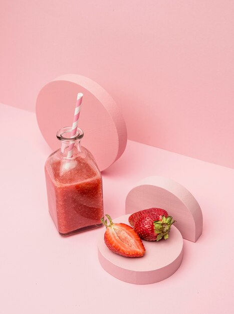 Jar with organic smoothie of strawberry