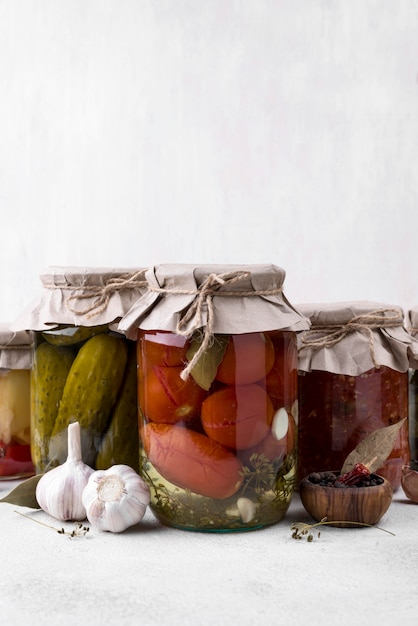 Free photo jars assortment with preserved vegetables