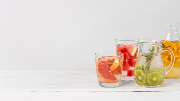 Jars with citrus flavor drinks
