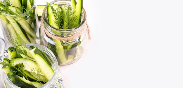 Jars with cucumbers and copy-space