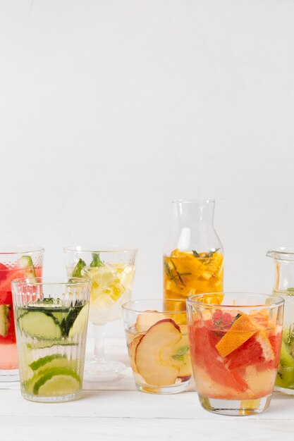 Jars with fresh fruits drinks