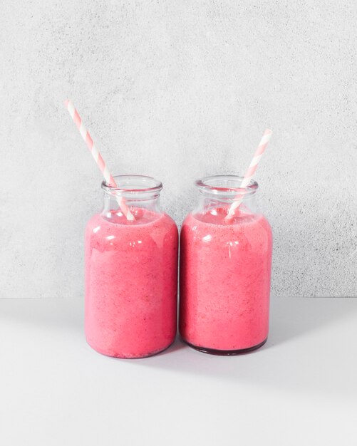 Jars with grapefruit smoothie