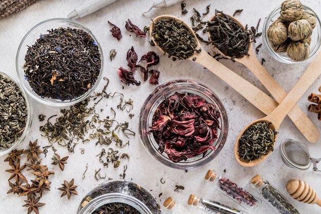 Jars with natural herbs on desk