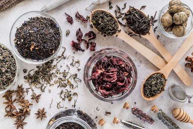 Jars with natural herbs on desk