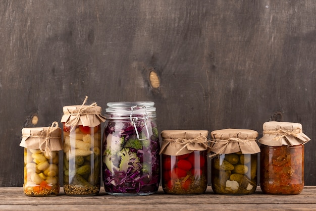Jars with preserved food arrangement